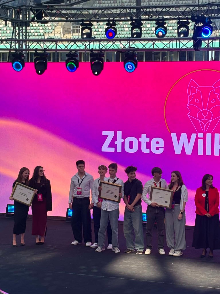 Studdly team on stage at Golden Wolf awards